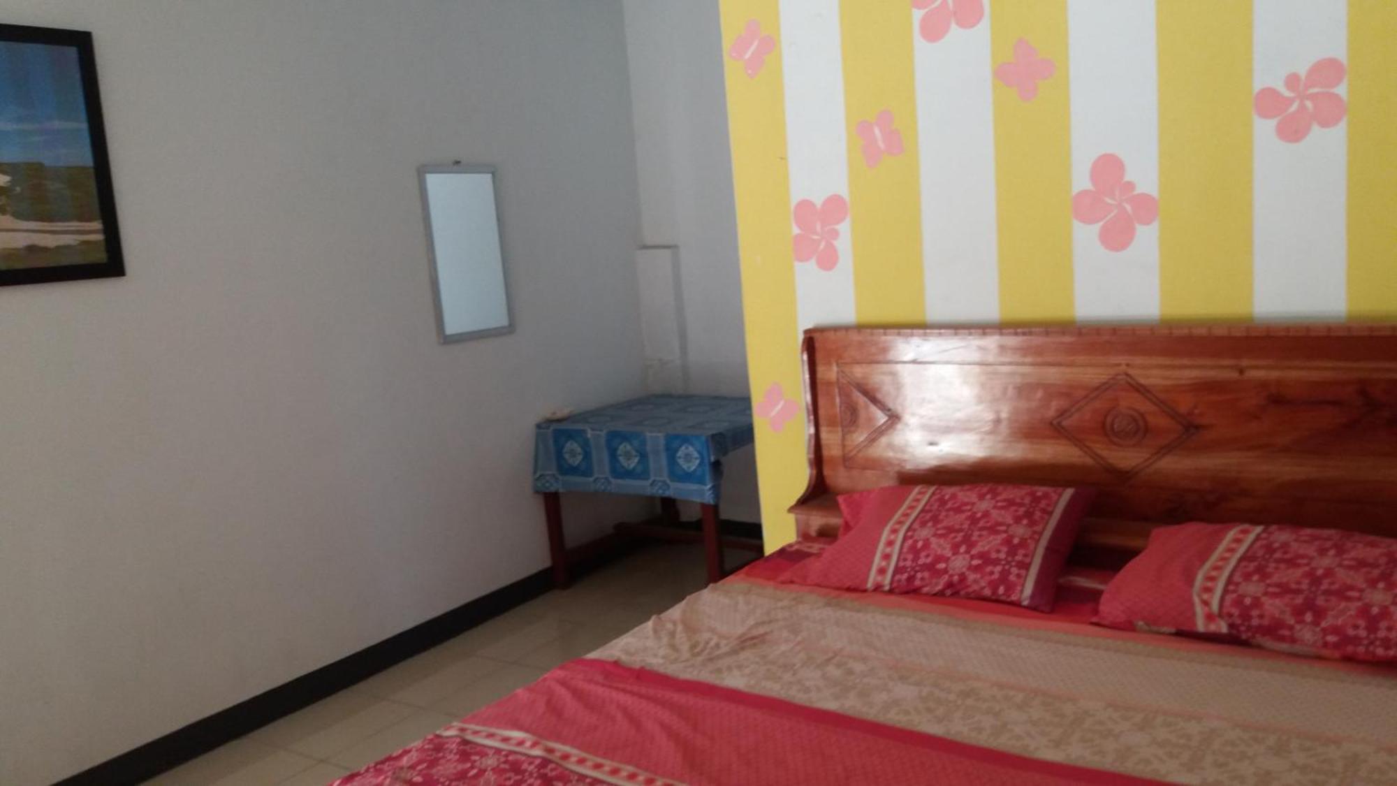 Ekas Beach Guesthouse Mitra Reddoorz Szoba fotó